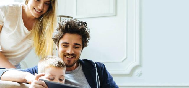 parents watching child play video games